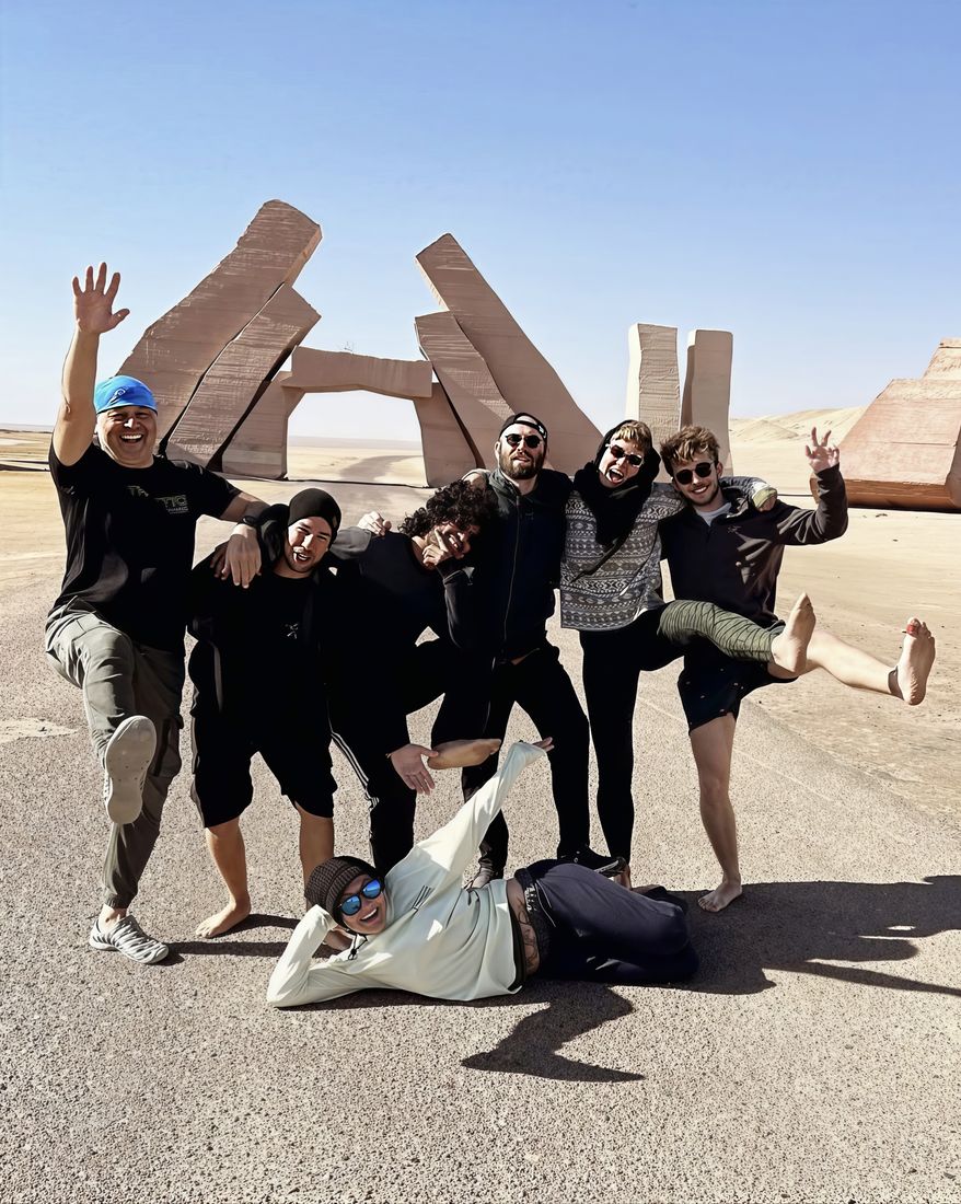 The group celebrating at the Ras Mohamed monument